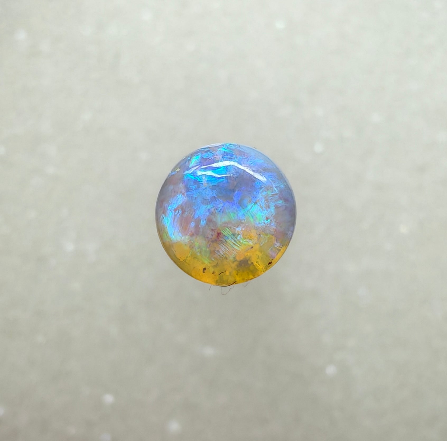 A982 - Round cut blue green crystal opal