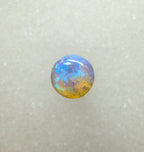 A982 - Round cut blue green crystal opal