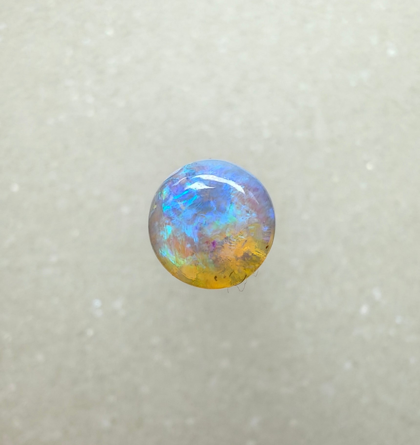 A982 - Round cut blue green crystal opal