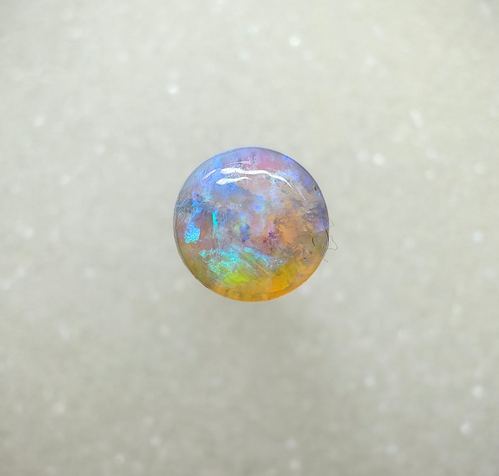 A982 - Round cut blue green crystal opal