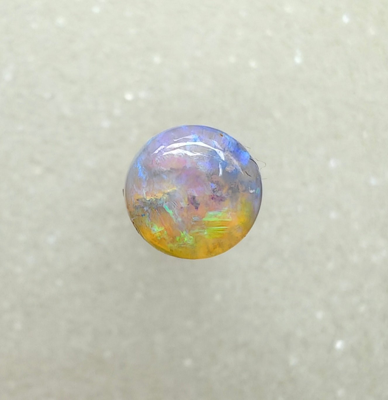 A982 - Round cut blue green crystal opal