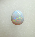 A996 - Large round cut pearl white opal.