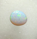A996 - Large round cut pearl white opal.