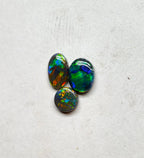 A1024 - Budget Black ring stone parcel.