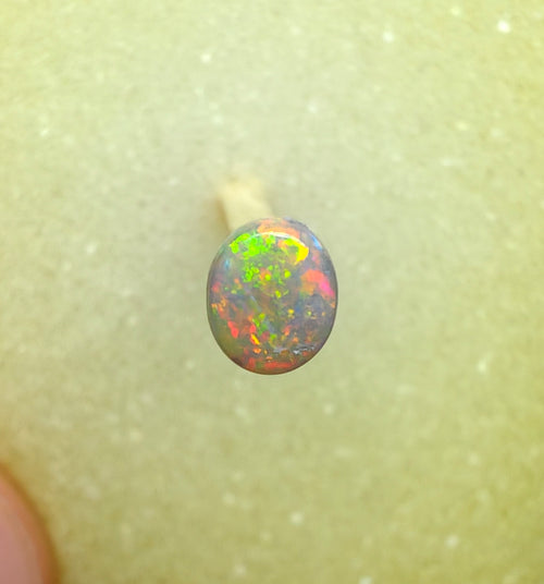 A1064 - Red and orange flash round cut