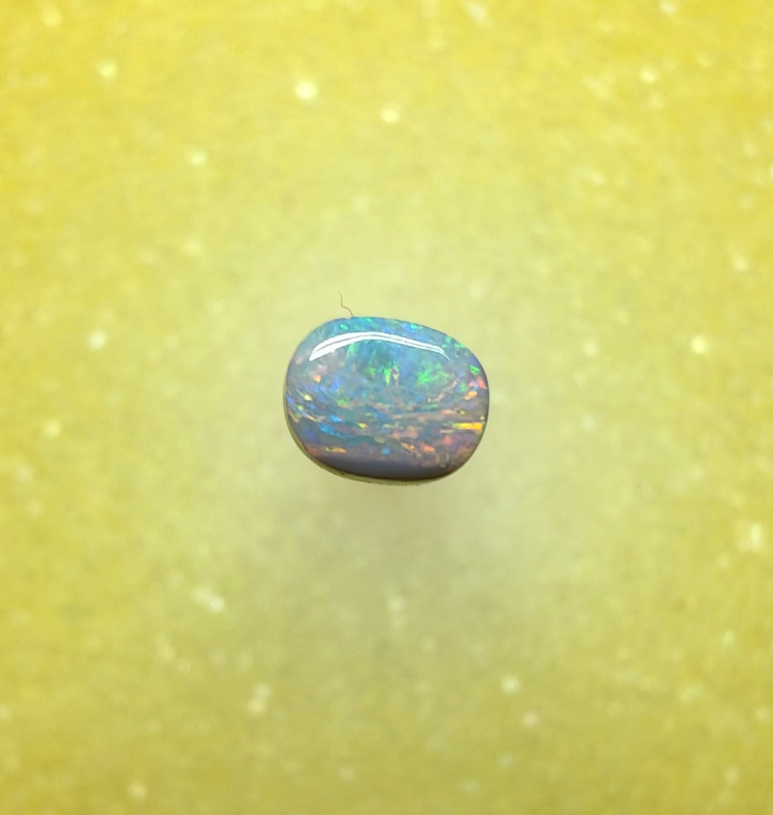 A1070 - Red flashy small ring stone