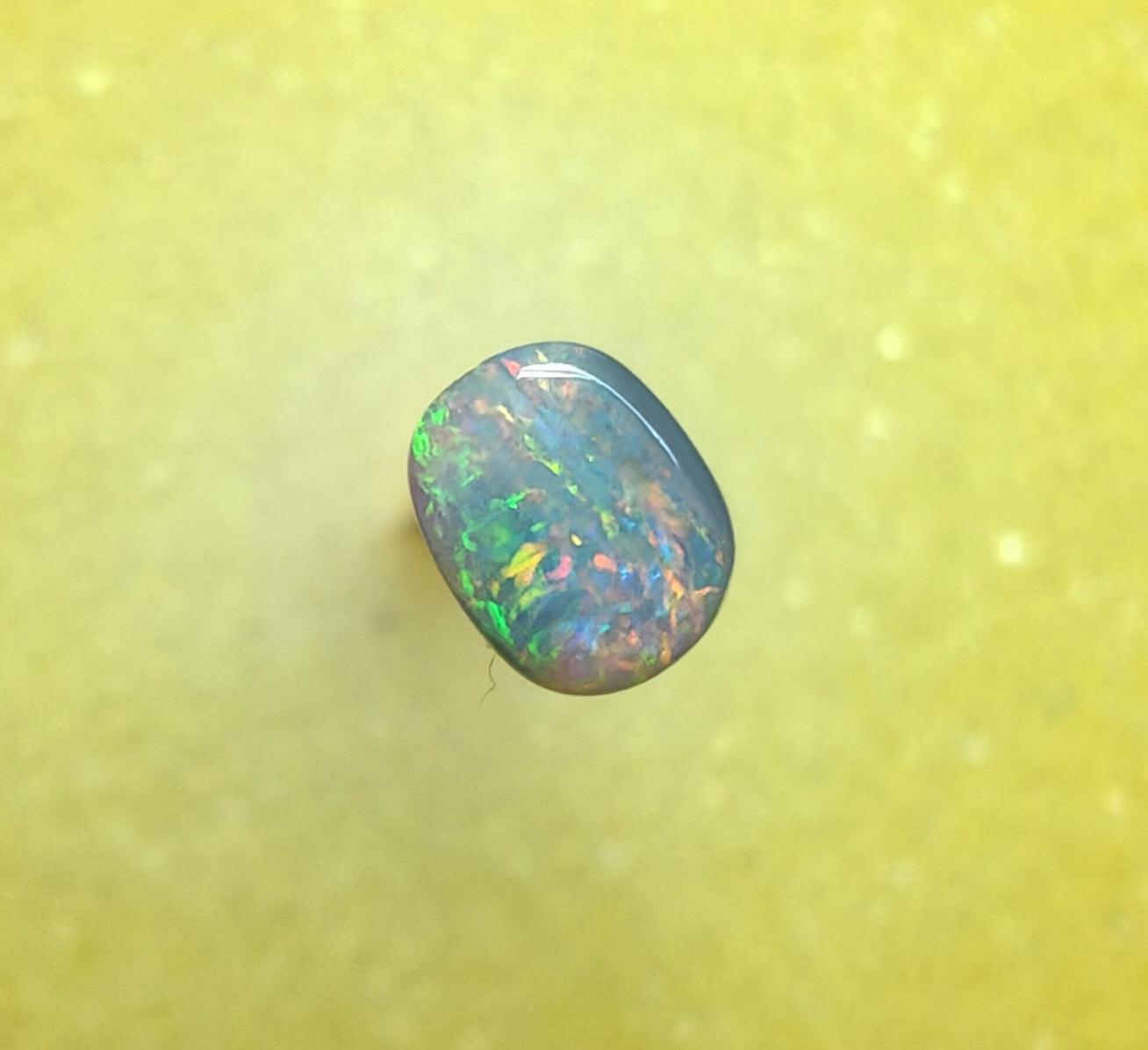 A1070 - Red flashy small ring stone