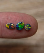 Black opal ring stone trio