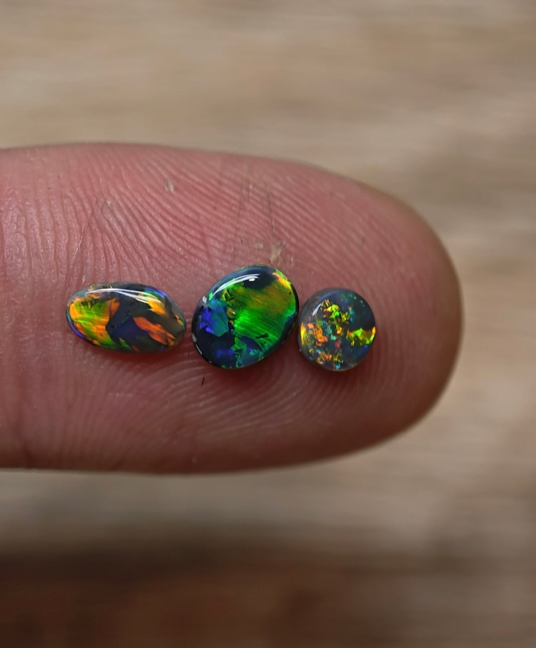 Black opal ring stone trio