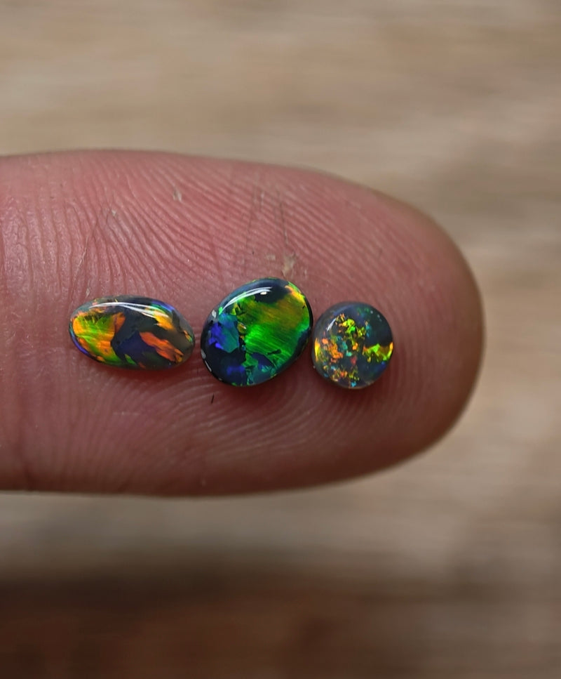 Black opal ring stone trio
