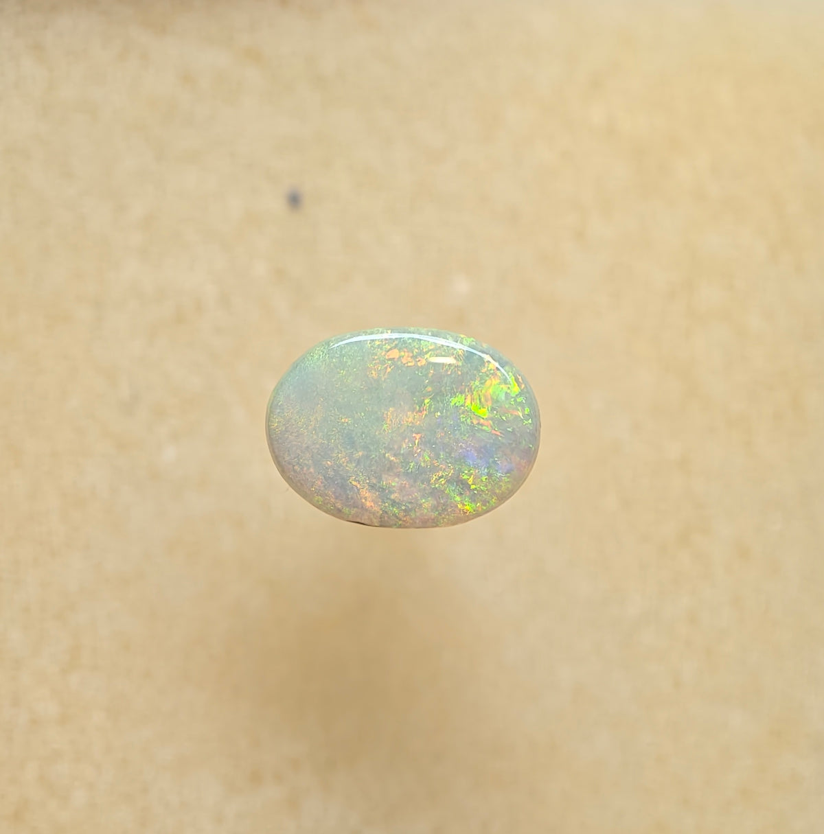 A1089 - Dark mossy pattern oval cut
