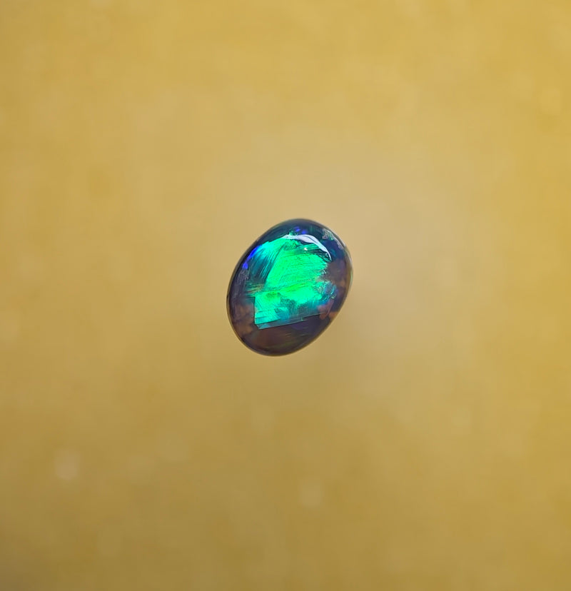 A1105 - Round cut bright crystal opal