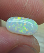 A911 - Oval cut bright red fire white opal