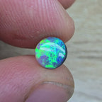 A845 - Round cut gem black opal