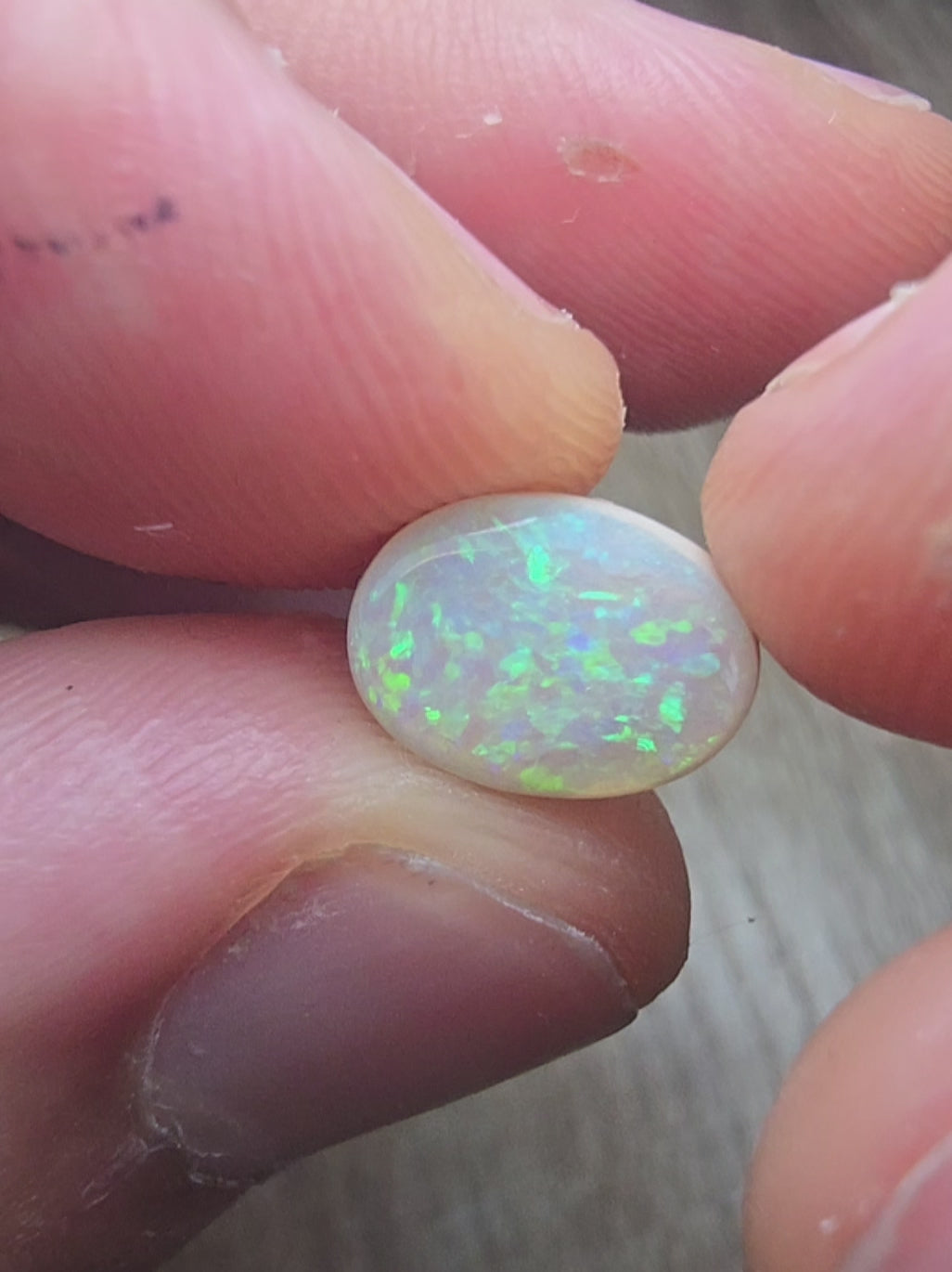 A111 - Oval cut white opal