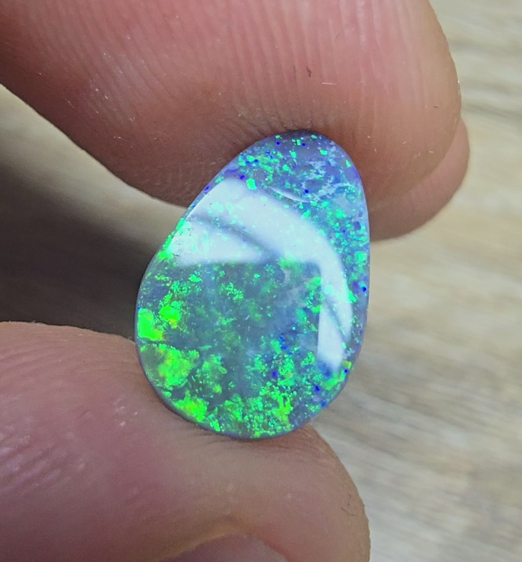 A897 - Strong large drop cut black opal