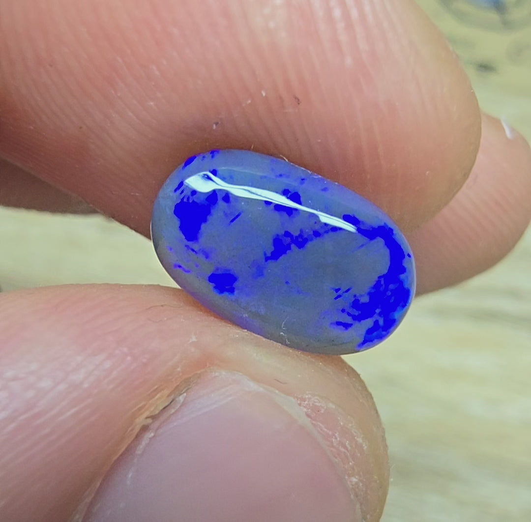 A890 - Large neon purple black crystal opal