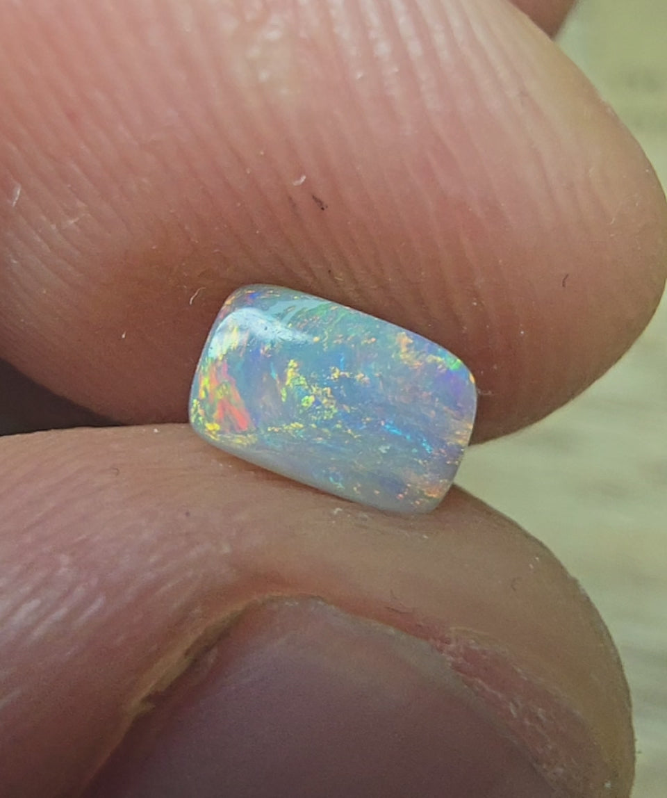 A888 - Bright rectangle cut dark opal