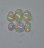 A970 - Jewellers parcel red flash white opal