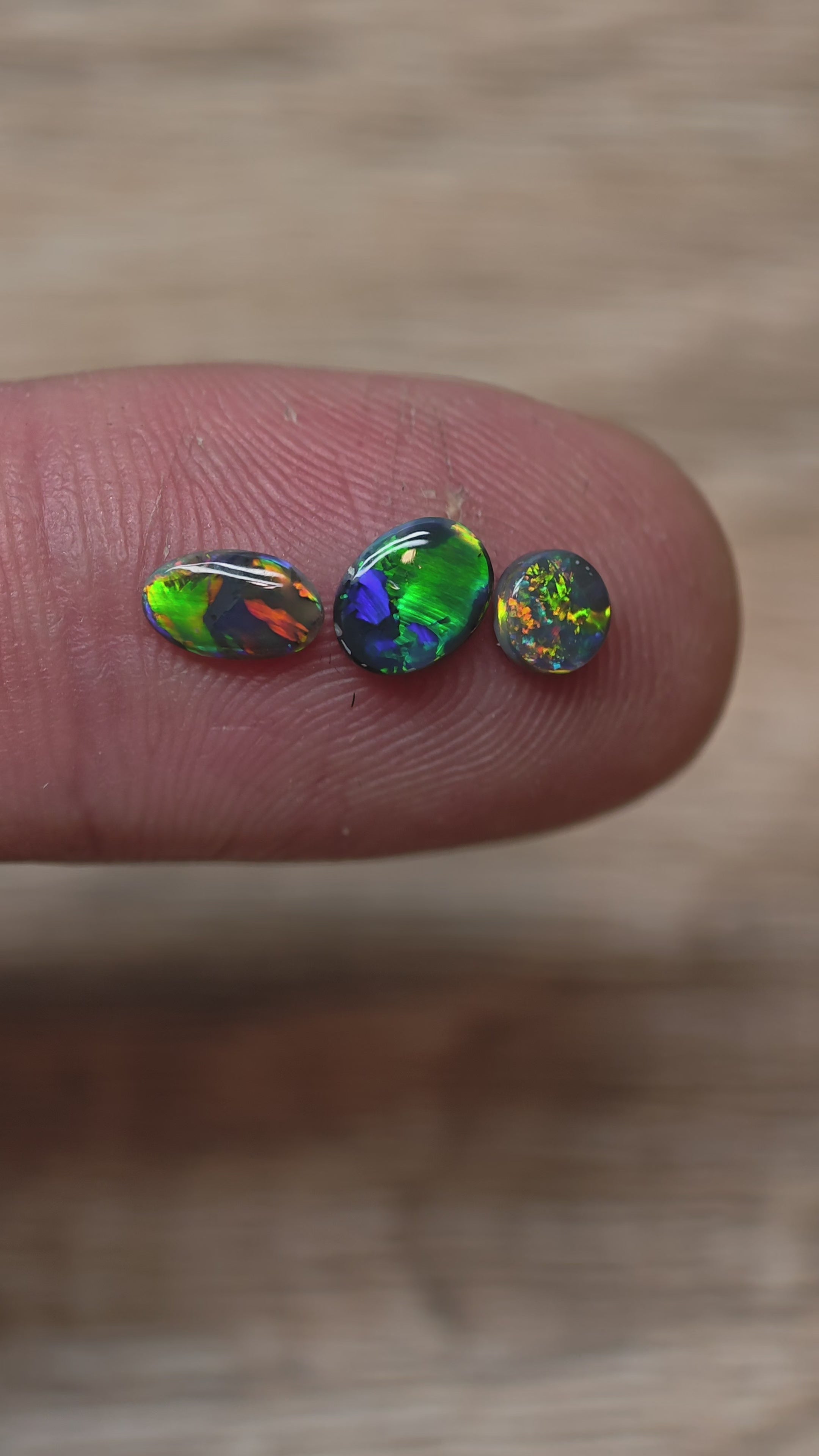 Black opal ring stone trio