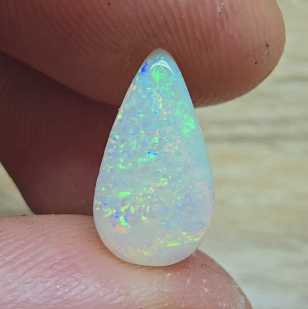 A910 - Bold drop cut white opal.