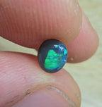 A826 - Small cab blue on black opal