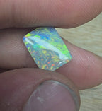 A940 - Stunning broad face cushion cut dark opal.